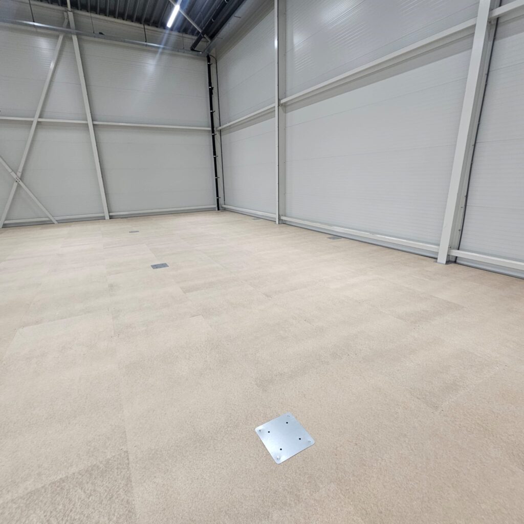 a room with a metal plate on the floor