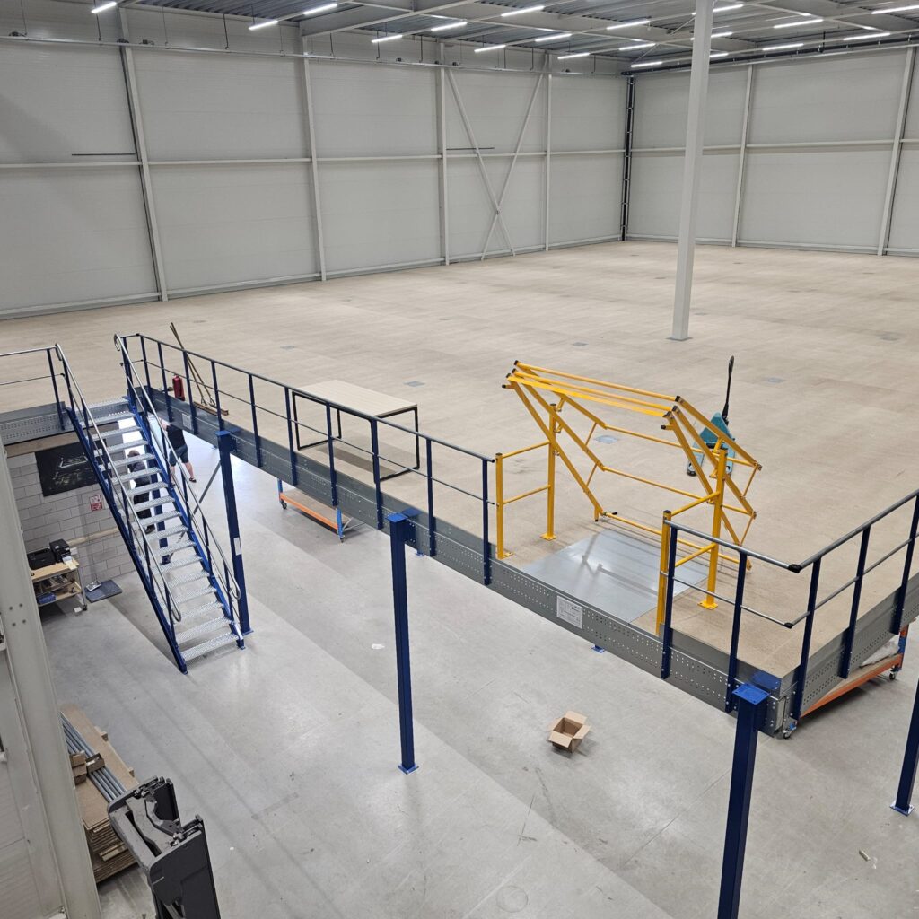 a large warehouse with stairs and stairs